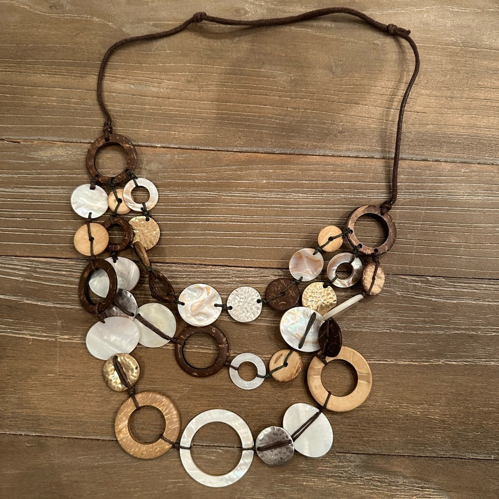 Adjustable leather, silver, gold, and wood necklace